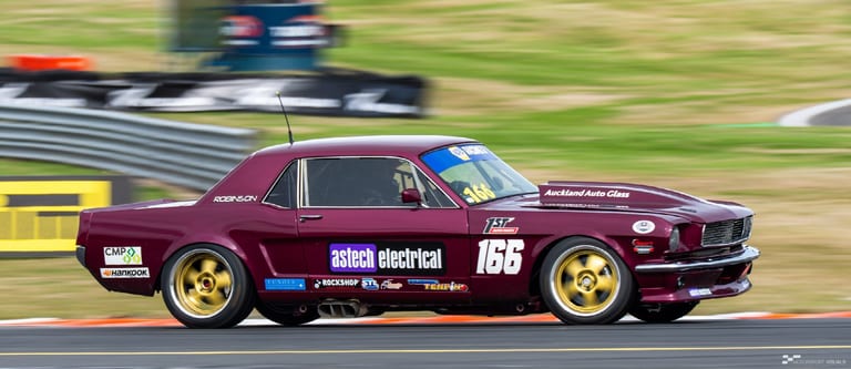 Classic car racing at Taupō Motorsport Park — motorsport photography by Ryan Watkinson